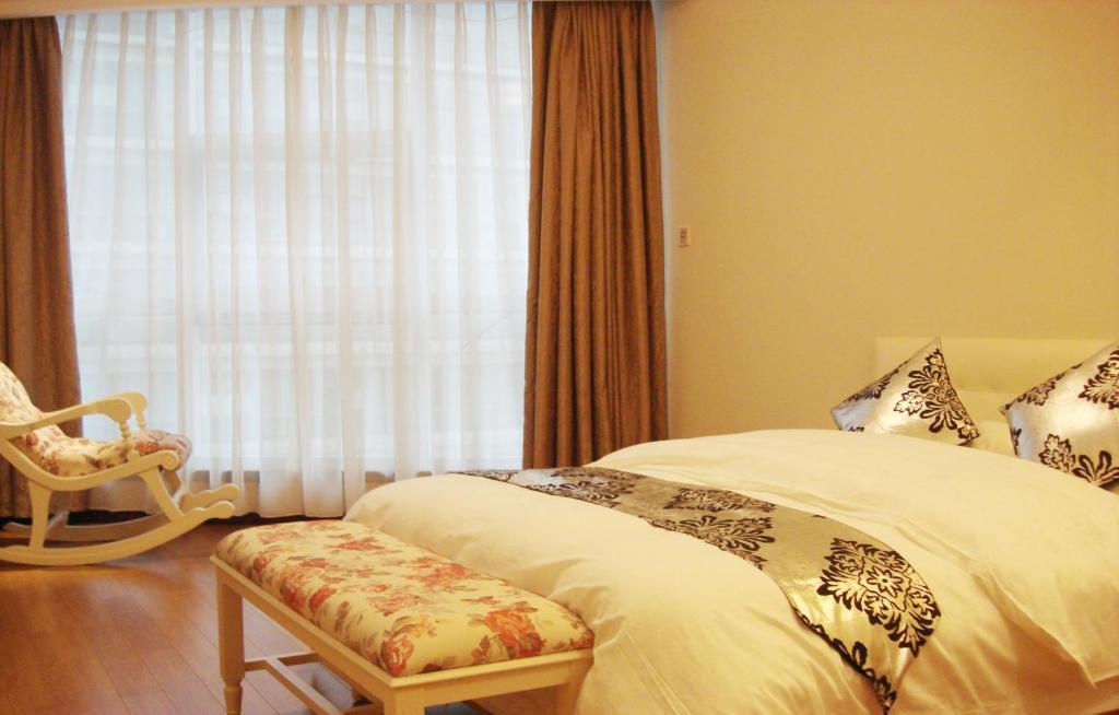 Hangzhou Yilin Hotel Apartment Zimmer foto